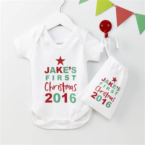 Start this tradition with a baby's first christmas ornament. personalised christmas star baby grow gift set by ...