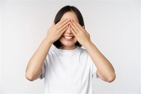 Portrait Of Asian Woman Covering Eyes Waiting For Surprise Blindfolded