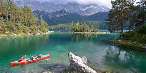 Lake Eibsee At The Foot Of Zugspitze Germanys Highest Mountain In