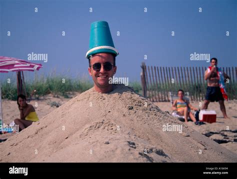 Man Covered In Sand Hi Res Stock Photography And Images Alamy