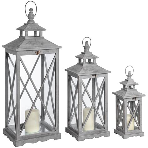 Set Of Three Wooden Lanterns With Traditional Cross Section Lanterns