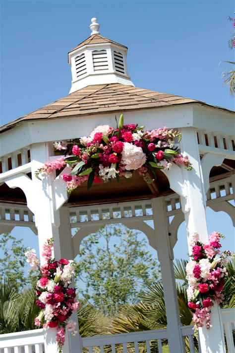 Pink And White Flower Arrangements On Gazebo