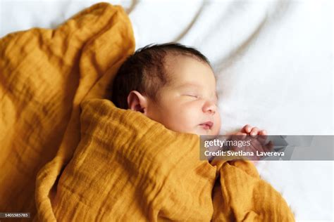 Top View Of Newborn Baby Sleeping On Bed Infant Lying On White Bed High