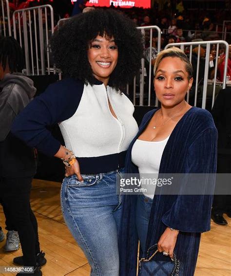 Crystal Hayslett And Gocha Hawkins Attend The Game Between Charolette