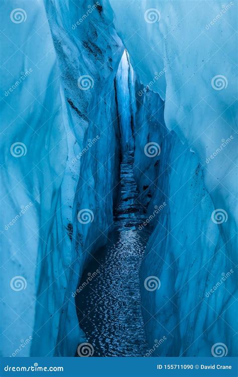 Icy Depths Of The Matanuska Glacier Inside A Water Filled Crevasse Full