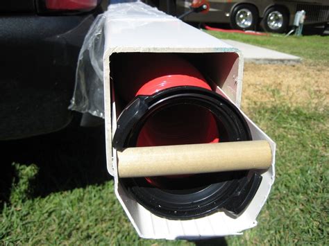 Paint your stinky slinky holder a dark color (mine is black) so it remains camoflaged under your rv; 25 Excellent Photo of RV Sewer Hose Storage Ideas