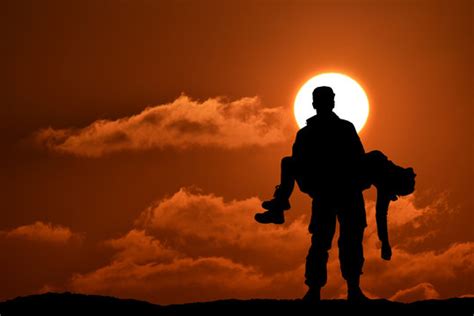 Soldier Carrying Another Soldier Silhouette