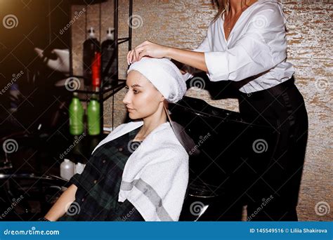 Beautiful Woman Washing Hair In A Hair Salon Stock Photo Image Of