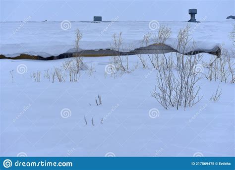 House Swept By Snow With Drifts On The Roof Stock Image Image Of