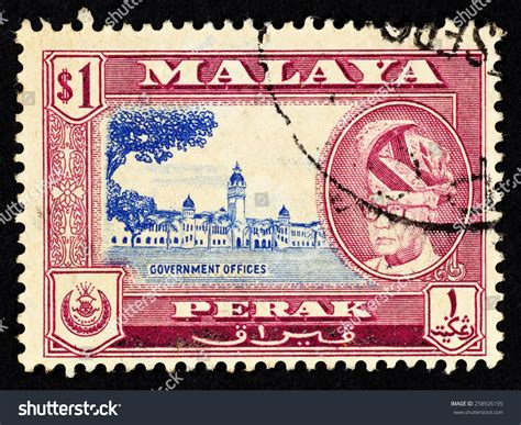 Upacara pemakaman sultan perak, almarhum sultan azlan shah. Malaya - Circa 1957: Red Color Postage Stamp Printed In ...
