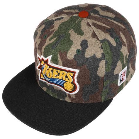 Philadelphia 76ers guard danny green suffered a strained right calf just minutes into friday's game 2 against the hawks and was ruled out for the rest of the game. HWC Camo Flannel 76ers Cap by Mitchell & Ness - 28,95