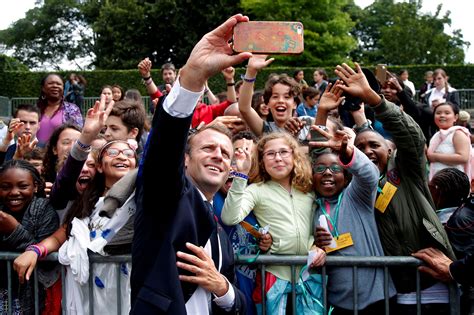 The controversial pictures were made during macron's visit to the caribbean island. Emmanuel Macron Finally Got to Play Father to a Bratty ...