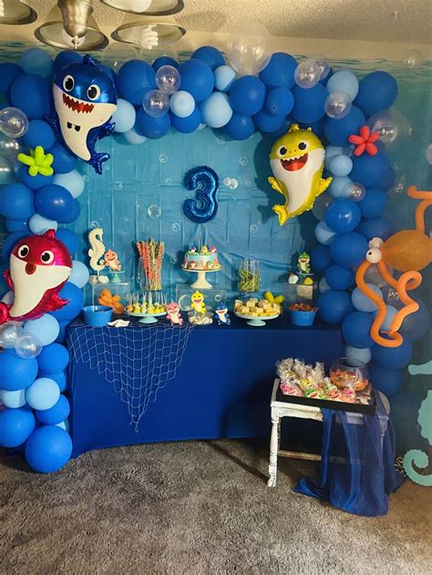 An Under The Sea Birthday Party With Balloons Decorations And Shark