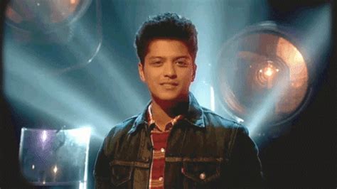 Not only is she smokin', she's a big fan of versace, having worn the brand's clothes on many of her. Bruno Mars, stilosissimo nel video di "Versace On The ...