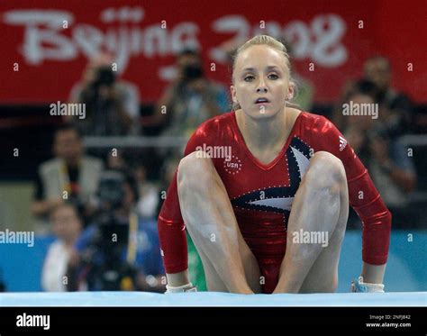 Us Gymnast Nastia Liukin Reacts After Falling On Dismount On The Uneven Bars During The Women