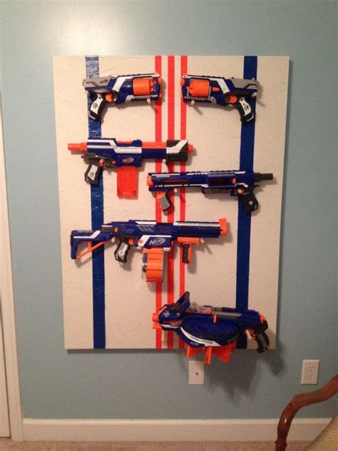 I went to home depot and got 1 one sheet of mdf board, 2 sheets of. Nerf gun rack! Perfect for a boys room. | Home | Pinterest ...