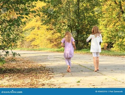 Little Kids Girls Walking Barefoot Stock Photo Image Of Girl Hold