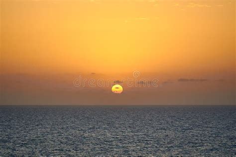Sun Rising At A Sunrise Above The Sea Stock Image Image Of Light