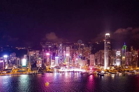 Amazing Night Aerial View Of Cityscape Of Victoria Harbour Center Of