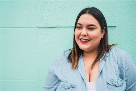 Premium Photo Close Up Of Young Plus Size Woman Smiling While