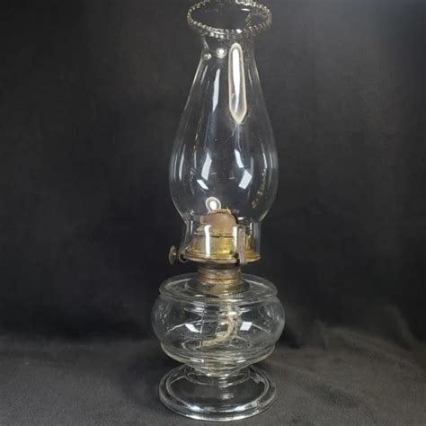 ANTIQUE OIL LAMP Clear Glass With Finger Loop Footed Made By P A