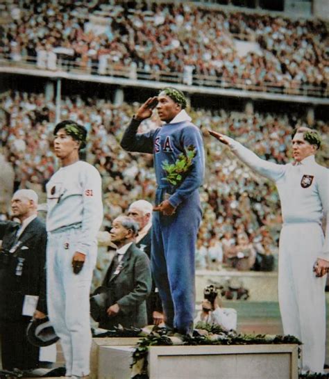 Us Athlete Jesse Owens Salutes During The Presentation Of His Gold