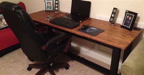 Next, measure the exact distance between the two 1×4 boards and cut 2 more 1×4 boards to that size for the two sides of the panel board. DIY Computer Desk | Hometalk