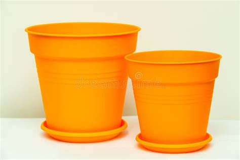 Bright Orange Flower Pots Made From Plastic Stock Photo Image Of
