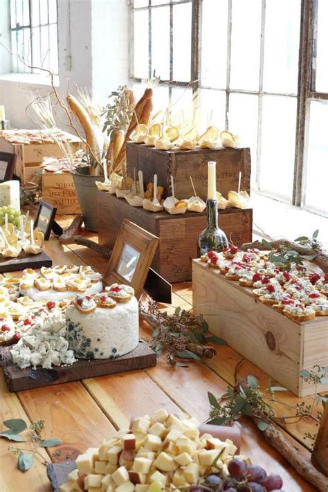 Make a unique rustic photo display with a stack of wooden crates. Rustic Wedding Food Displays