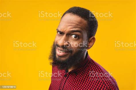 Confused African American Man Looking At Camera Stock Photo Download