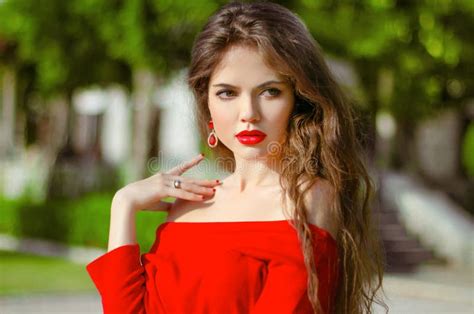 Beautiful Young Girl Outdoor Portrait Fashion Brunette In Red Stock