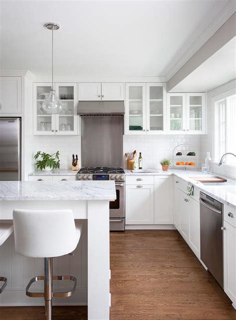 White Kitchen With Glass Front Cabinets Transitional Kitchen