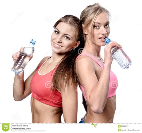 Women Drinking Water After Fitness Exercise Stock Image