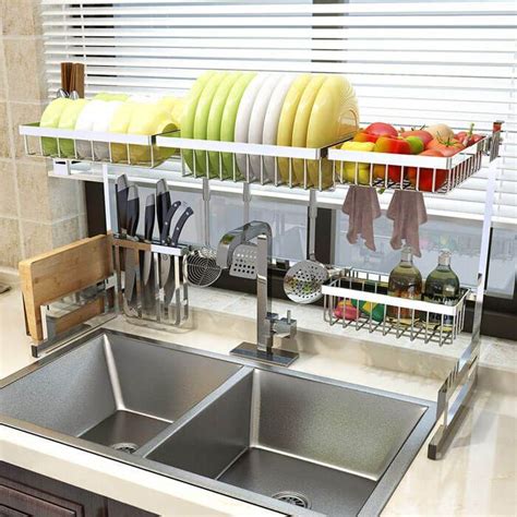 This caddy saves space at the sink by hanging over a back corner of the sink area. Small Kitchen? No Problem, These Products Can Help ...