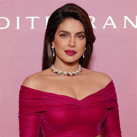 Priyanka Chopra Heats Up The Internet In A Red Hot Swimsuit To Mark
