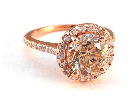 This engagement ring setting measures 2.5mm wide, is crafted of quality 14 karat rose gold and features diamonds in both bezel and pavé settings. European Engagement Ring - Champagne Diamond Halo Engagement Ring, Cathedral Rose Gold diamond ...