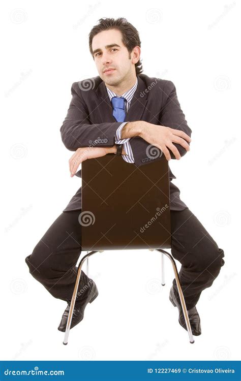 Business Man Portrait Sitting On A Chair Royalty Free Stock Images