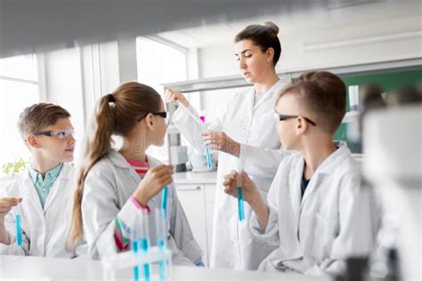Teacher And Students Studying Chemistry At School Stock Image Image