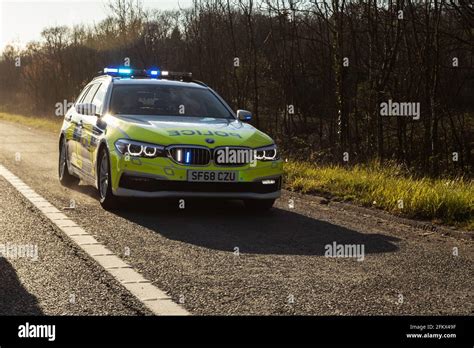 Blue Lighted Ambulance On A Motorway Hard Shoulder Stock Photo Alamy