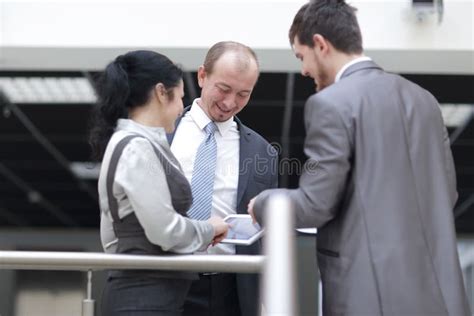Employees Are Talking In The Lobby Of The Office Stock Photo Image Of