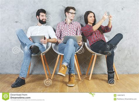 White Adults Using Electronic Gadgets Stock Photo Image