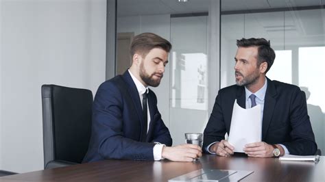 Two Businessmen Talking During Business Meeting At Corporate Office Stock Footagebusiness