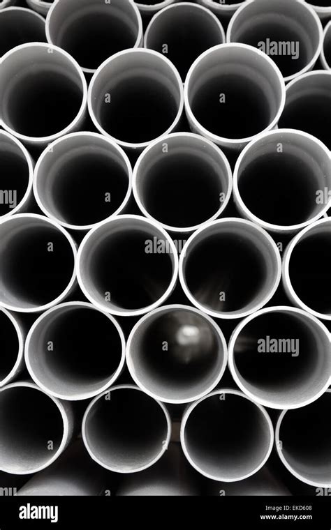 Gray Pvc Tubes Plastic Pipes Stacked In Rows Stock Photo Alamy