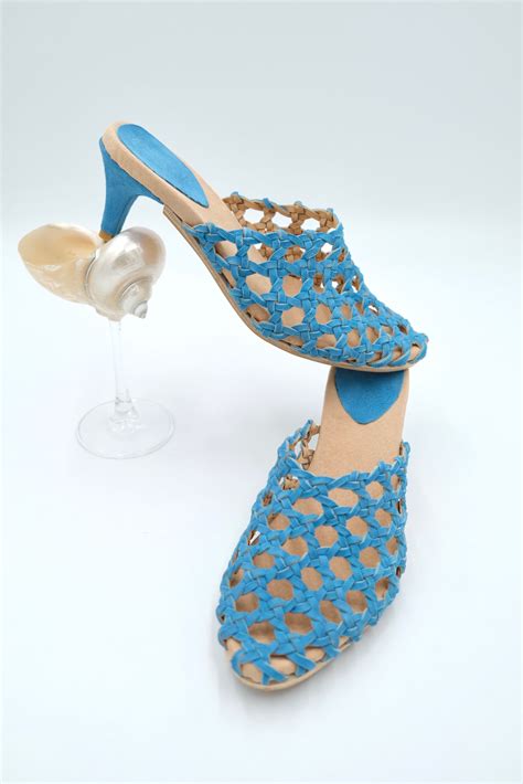 The Rosette Kitten Heel Ocean Blue Suede Woven Palm