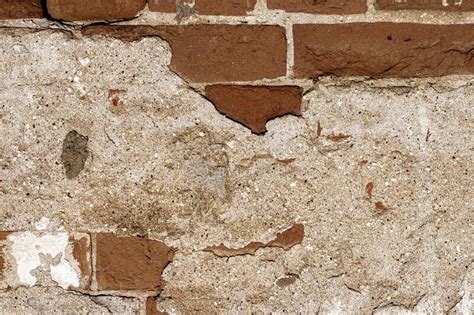 Old Grunge Brick Wall Texture With Destroyed Plaster Stock Photo