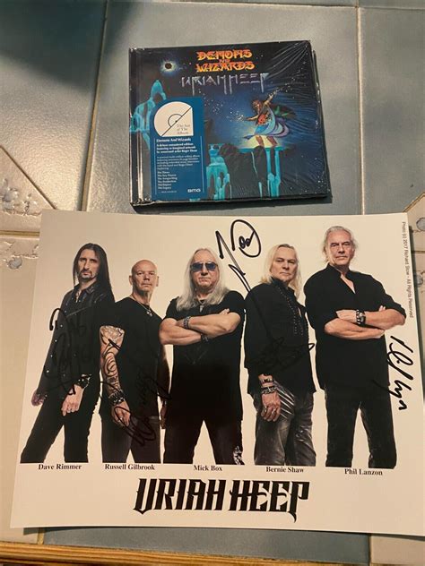 Uriah Heep Autograph Signed Press Photo And Demons And Wizards Book Style