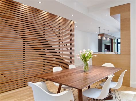 The Wood Slat Feature Wall Acts As A Grounding Element In The Middle Of