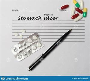 Stomach Ulcer Diagnosis Written On A White Piece Of Paper Stock Photo