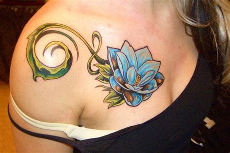 Blue Lotus With Tracery Tattoo On Chest Tattooimagesbiz