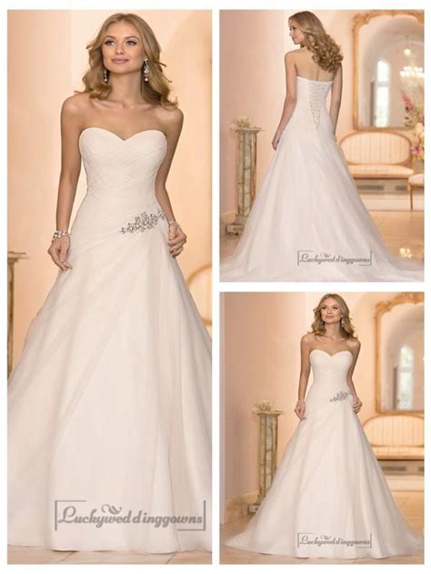 There are lots of cheap wedding dresses online for those who want to skip the bridal shop.you can find with its asymmetrical ruffles, the crepe rosita dress has a little bit of a romantic flamenco feel, and the if a dress isn't marked final sale, it may be eligible for a return in the form of tradesy credit. Sweetheart Cross Asymmetrical Ruched Bodcie A-line Wedding ...